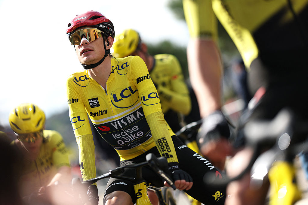 Team Visma - Lease a Bike's Danish rider Jonas Vingegaard, wearing the overall leader yellow jersey, waits for the start of the 8th and final stage of the Paris-Nice cycling race, 129.2 km between Nice and Nice, on March 15, 2026. (Photo by Anne-Christine POUJOULAT / AFP)