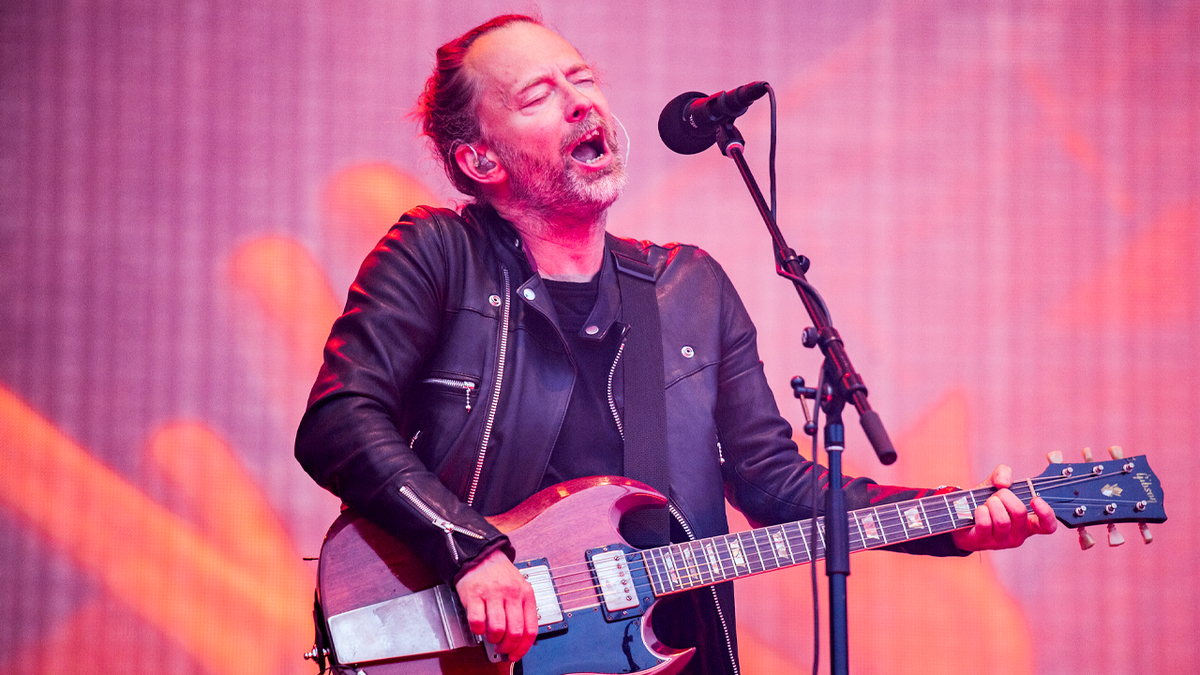 Thom Yorke performs on stage