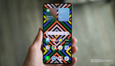 Someone holding a Samsung Galaxy S26 with its display on.