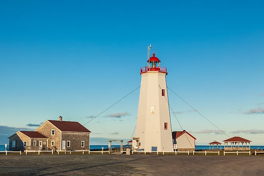 Miscou Lighthouse at sunset on Miscou Island, New Brunswick, Canada