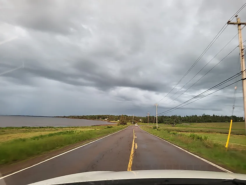 Driving along the Sunrise Trail in Nova Scotia with ocean views