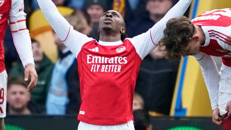 Eberechi Eze celebrates after firing Arsenal into a 2-1 lead at Mansfield