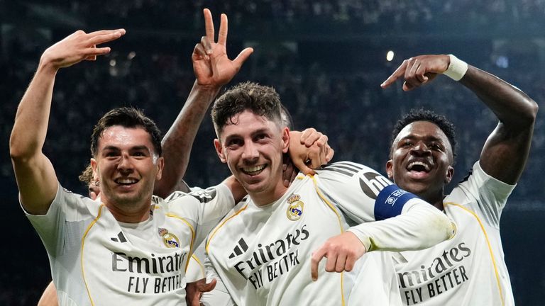 Real Madrid's Federico Valverde celebrates after scoring his third goal against Manchester City in the Champions League