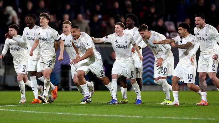 Nottingham Forest players celebrate their penalty shootout win in the Europa League at Midtjylland