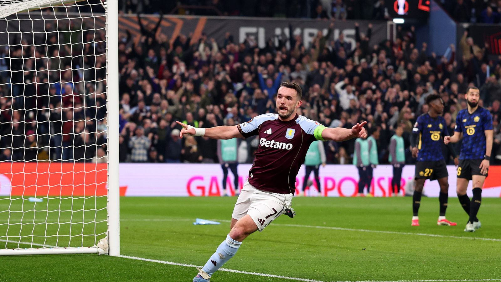 John McGinn celebrates after scoring for Aston Villa against Lille
