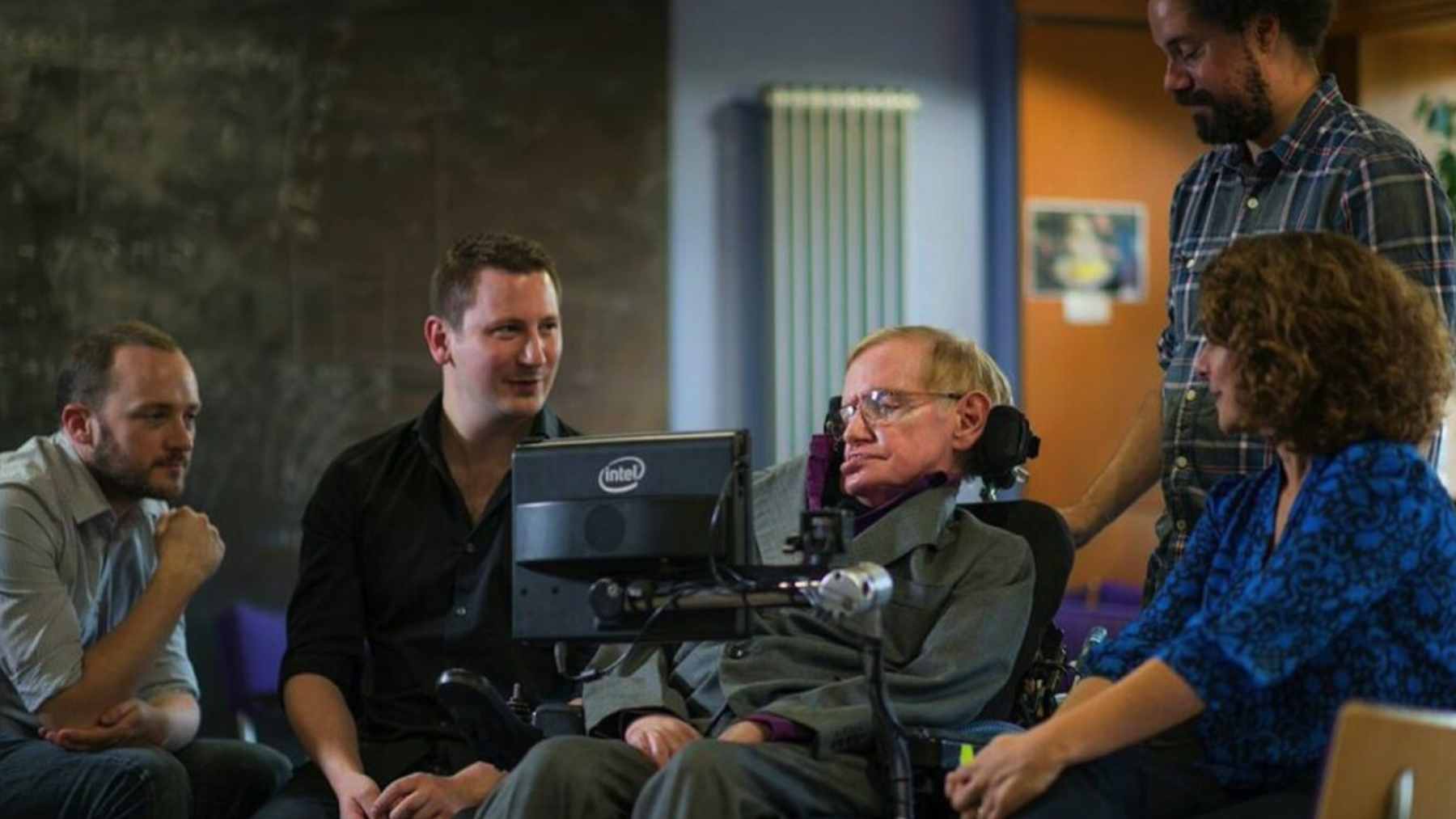 Physicist Stephen Hawking using his specialized communication system to deliver a lecture on the future of humanity and space exploration.