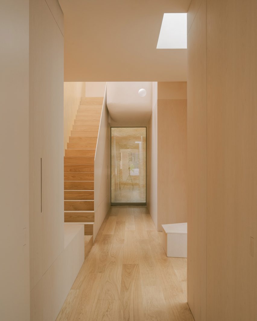 Wood-lined interior of Mozart House by Studio Dera