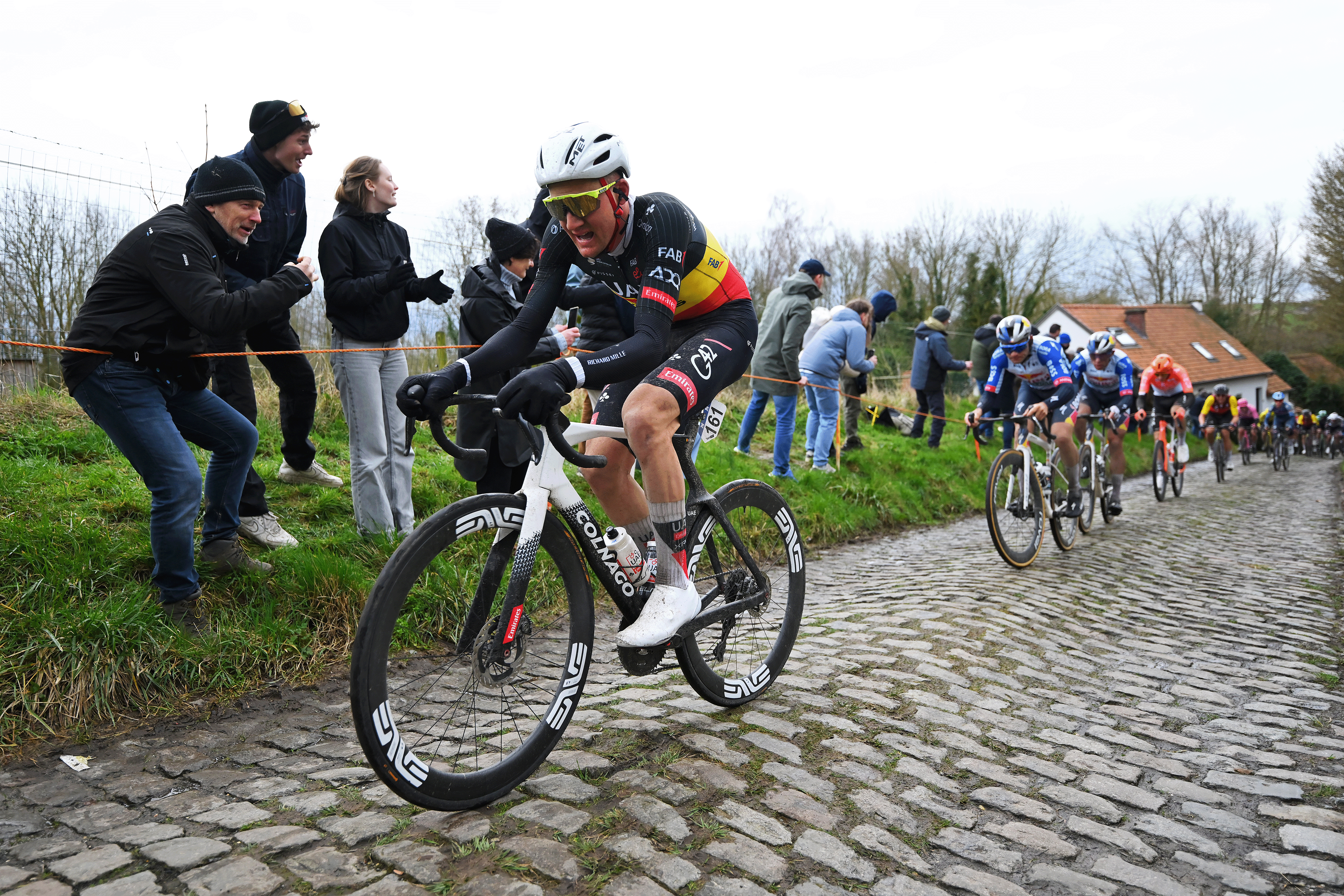 NIVONE, BELGIUM - FEBRUARY 28: Tim Wellens of Belgium and UAE Team Emirates - XRG competes passing through the Leberg cobblestones sector during the 21st Omloop Het Nieuwsblad 2026, Men's Elite a 207.2km one day race from Ghent to Ninove / #UCIWT / on February 28, 2026 in Ninove, Belgium. (Photo by Tim de Waele/Getty Images)