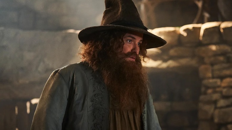 Tom Bombadil wearing his hat in his house in The Lord of the Rings: The Rings of Power
