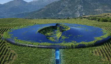 ufo-like winery by 314 architecture studio appears half buried in greek vineyards
