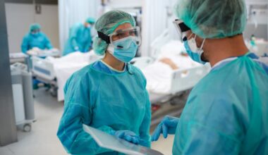 Physicians in a hospital room.