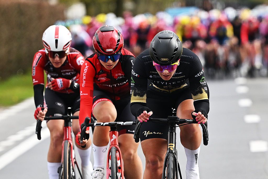 WEVELGEM, BELGIUM - MARCH 29: (L-R) Lea Lin Teutenberg of Germany and Team Lotto Intermarch&eacute; Ladies, Heidi Antikainen of Finland and Team MinMax Cycling and Yonna van Dam of Netherlands and Team Citymesh - Customm Pro Cycling compete in the breakaway during the 13th In Flanders Fields - From Middelkerke to Wevelgem 2026 - Women's Elite a 135.2km one day race from Wevelgem to Wevelgem / #UCIWWT / on March 29, 2026 in Wevelgem, Belgium. (Photo by Luc Claessen/Getty Images)
