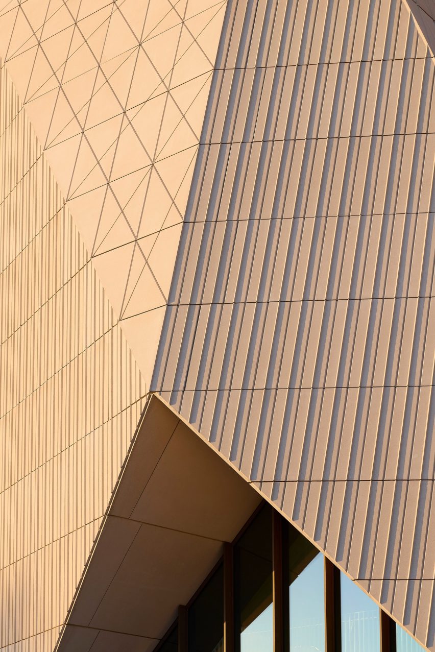 The panels contain patterns informed by the V&A logo