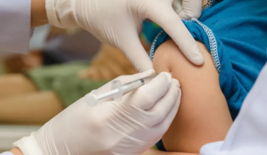 A child receives a vaccine injection.