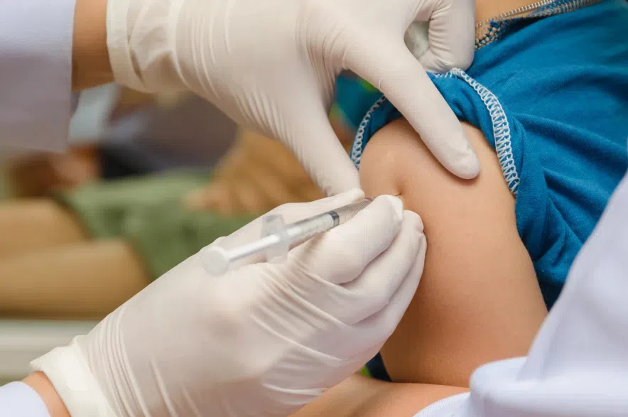 A child receives a vaccine injection.