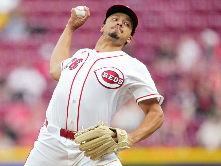 Burns earns 1st major-league win over Pirates