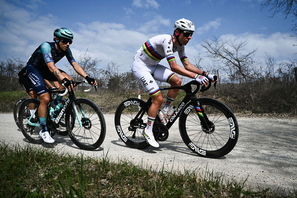 UAE Team Emirates's Slovenian Tadej Pogacar rides during the 20th one-day classic 'Strade Bianche' (White Roads) men's cycling race between Siena and Siena in Tuscany on March 7, 2026. (Photo by Marco BERTORELLO / AFP)