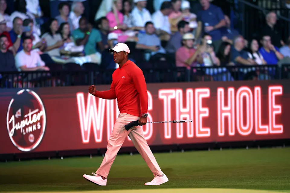 Tiger celebrates on the ninth hole during Monday's match. Tonight, he'll do so as a playing member of the team. (James Gilbert/TGL Golf via Getty Images)