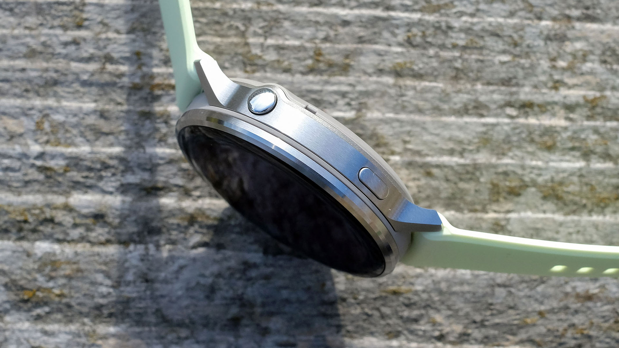 a close-up picture of the control buttons on the Garmin Venu 4 smartwatch