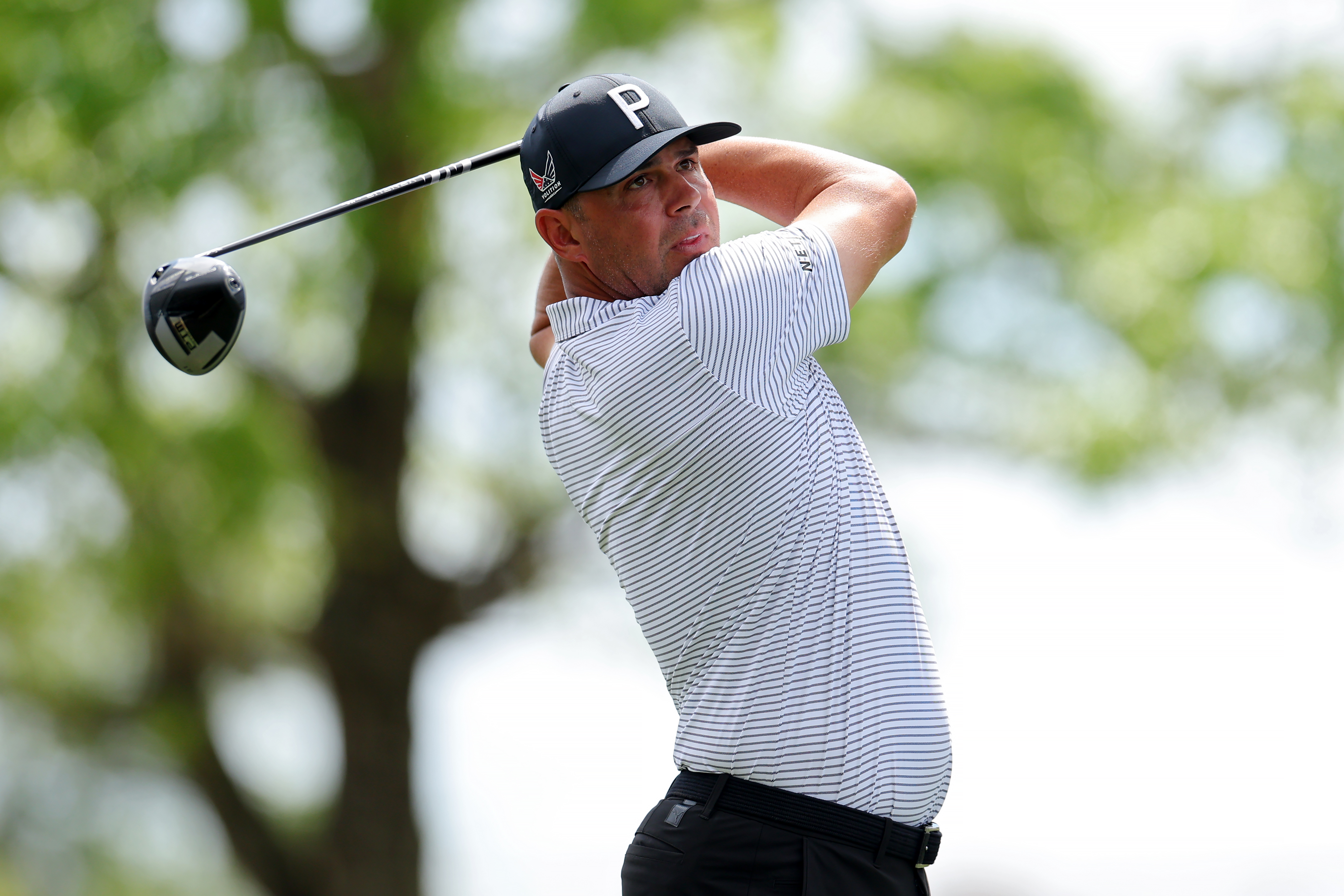 Gary Woodland holds his finish on a drive