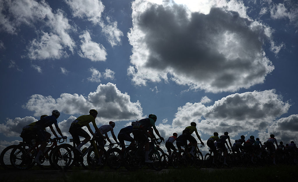 The pack rides during the 2nd stage of the Paris-Nice cycling race, 187 km between &Eacute;p&ocirc;ne and Montargis, on March 9, 2026. (Photo by Anne-Christine POUJOULAT / AFP)