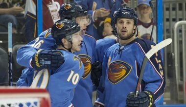 Mar 27, 2011; Atlanta, GA, USA; Atlanta Thrashers center Bryan Little (10) celebrates scoring a goal against the Ottawa Senators with right wing Blake Wheeler (26) and defenseman Zach Bogosian (4) in the second period at Philips Arena. Mandatory Credit: Dale Zanine-Imagn Images