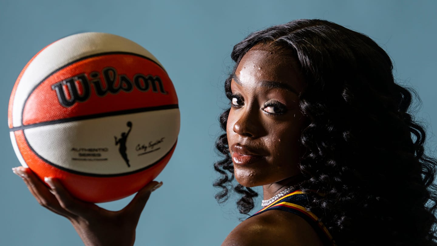 Indiana Fever guard Raven Johnson (3) poses for a photo Wednesday, April 22, 2026, during media day at Gainbridge Fieldhouse in Indianapolis.
