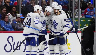 Jan 12, 2026; Denver, Colorado, USA; Toronto Maple Leafs center Auston Matthews (34) celebrates his goal with defenseman Morgan Rielly (44),right wing William Nylander (88), and defenseman Brandon Carlo (25) in the third period against the Colorado Avalanche at Ball Arena. Mandatory Credit: Ron Chenoy-Imagn Images