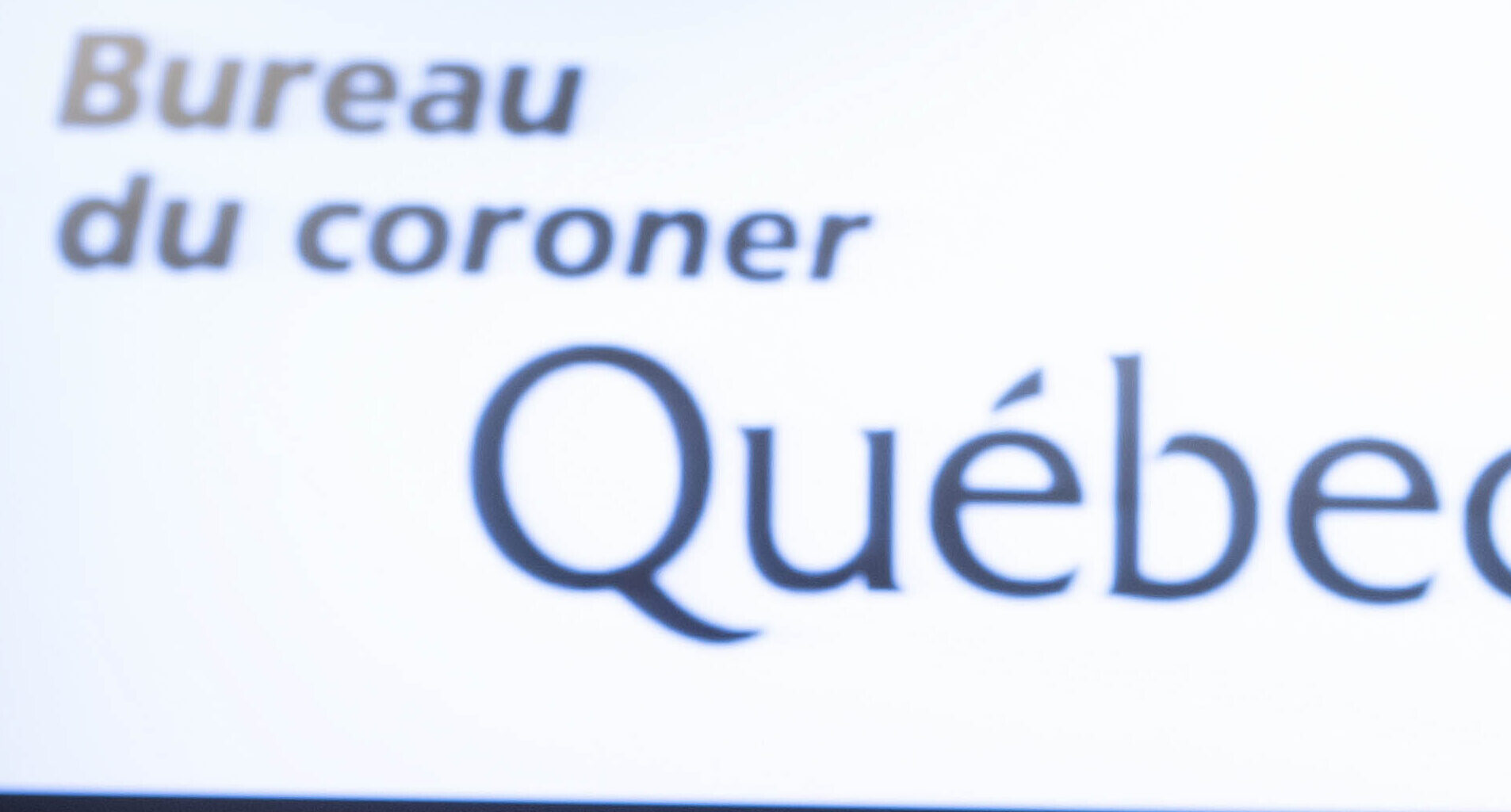 Quebec coroner signage.
