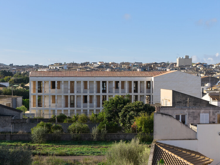 Ten Social Housing Units in Santa Margalida, Mallorca / Javier Gavín + Siddartha Rodrigo + Juan Moreno + DATAAE - Exterior Photography, Balcony