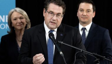 Bernard Drainville speaks to the media as Sonia Bélanger and Simon Jolin-Barrette look on in Montreal on Monday, April 6, 2026.