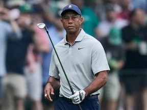 Tiger Woods walks to the first green during a practice for the Masters at Augusta National Golf Club in 2023.