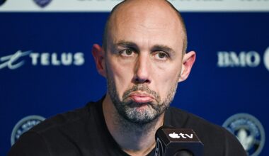 Former CF Montréal head coach Marco Donadel frowns during a press conference.