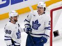 Toronto Maple Leafs left winger Matthew Knies is congratulated by William Nylander (88) after his empty-net goal against the Boston Bruins.