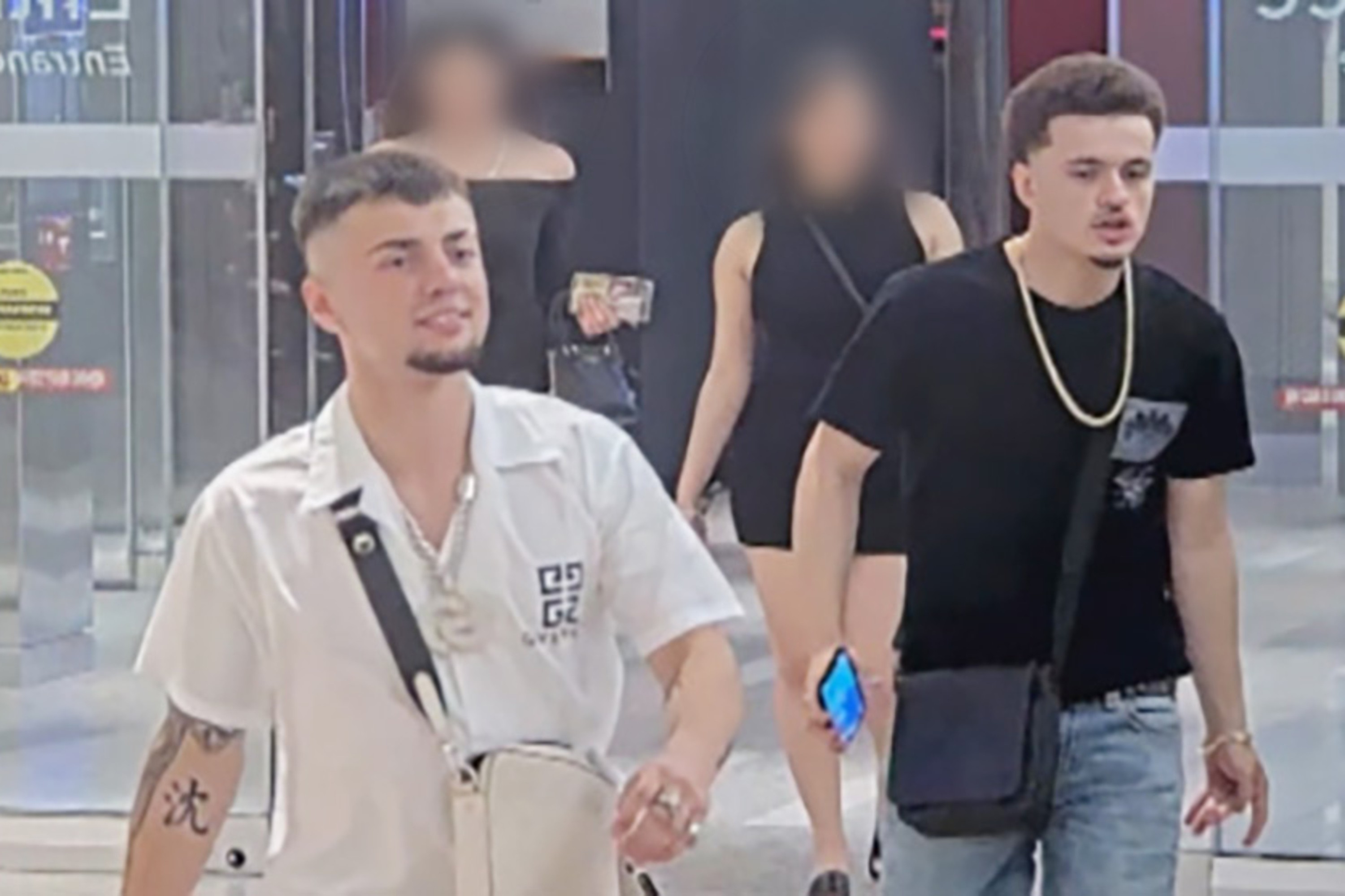 An image recorded by a camera at the Montreal Casino of Chad Pinel (left, wearing a white shirt) and Jayden Pinel (right, wearing a black shirt)