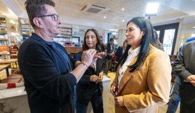 Restaurant owner, right, speaks to Montreal