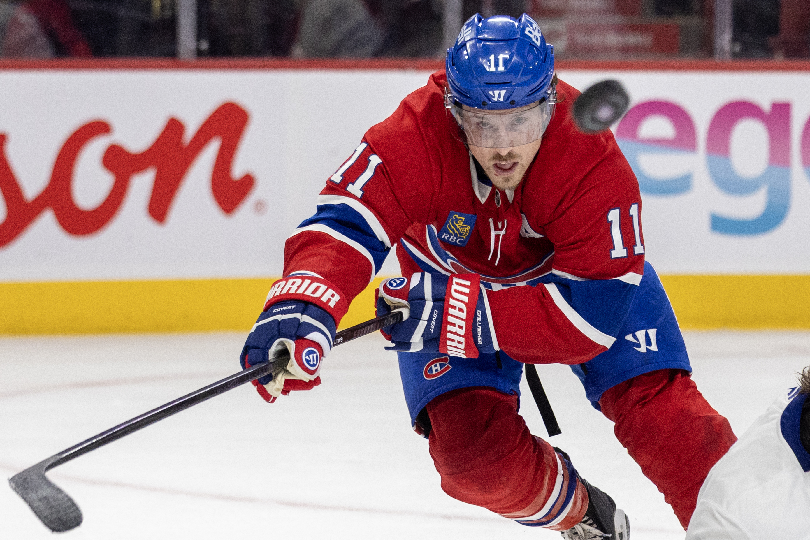 Canadiens' Brendan Gallagher concentrates on the puck as it flies past his head.