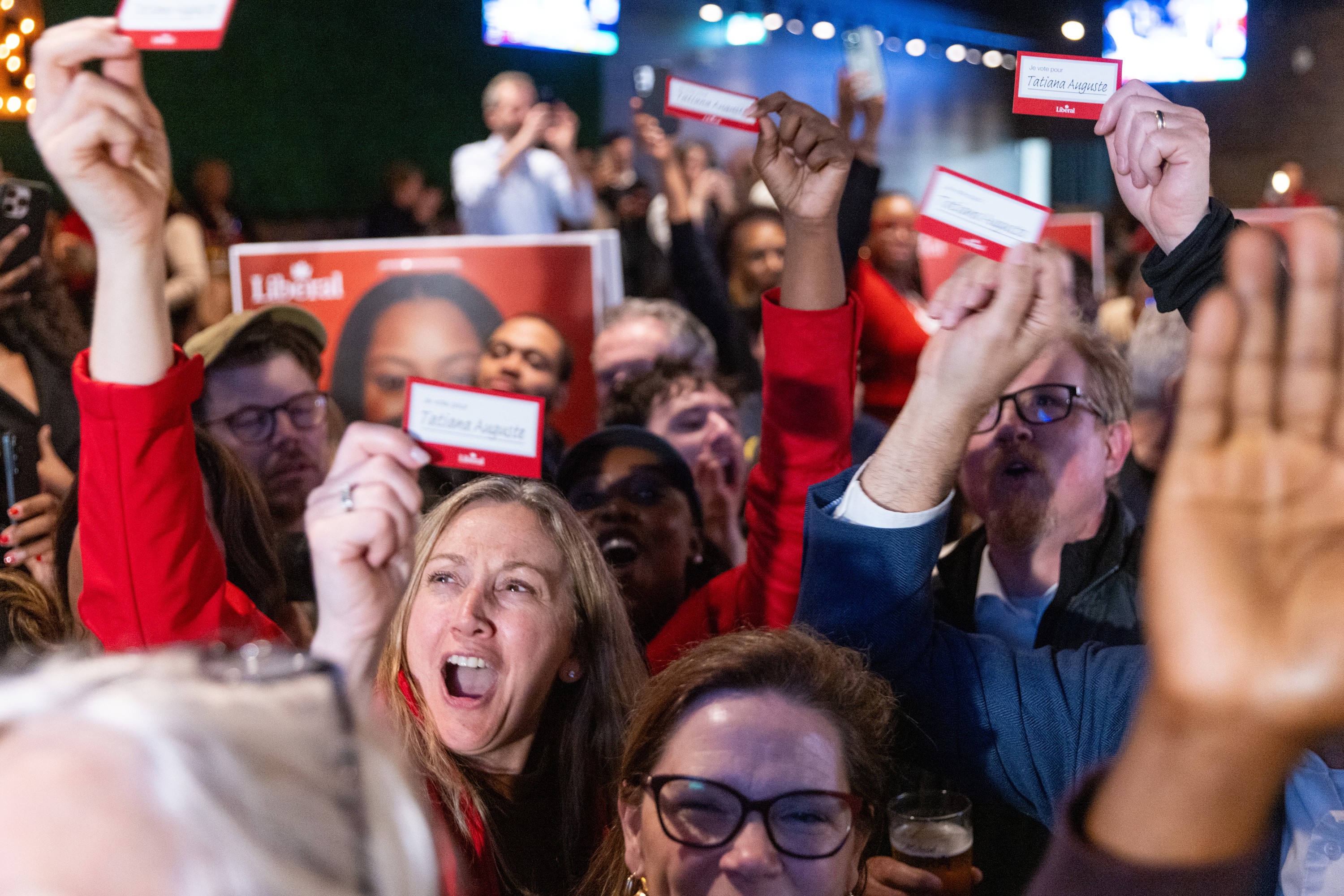 Liberal supporters celebrate Tatiana Auguste's byelection victory in Terrebonne.