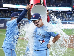 Davis Schneider of the Toronto Blue Jays is doused