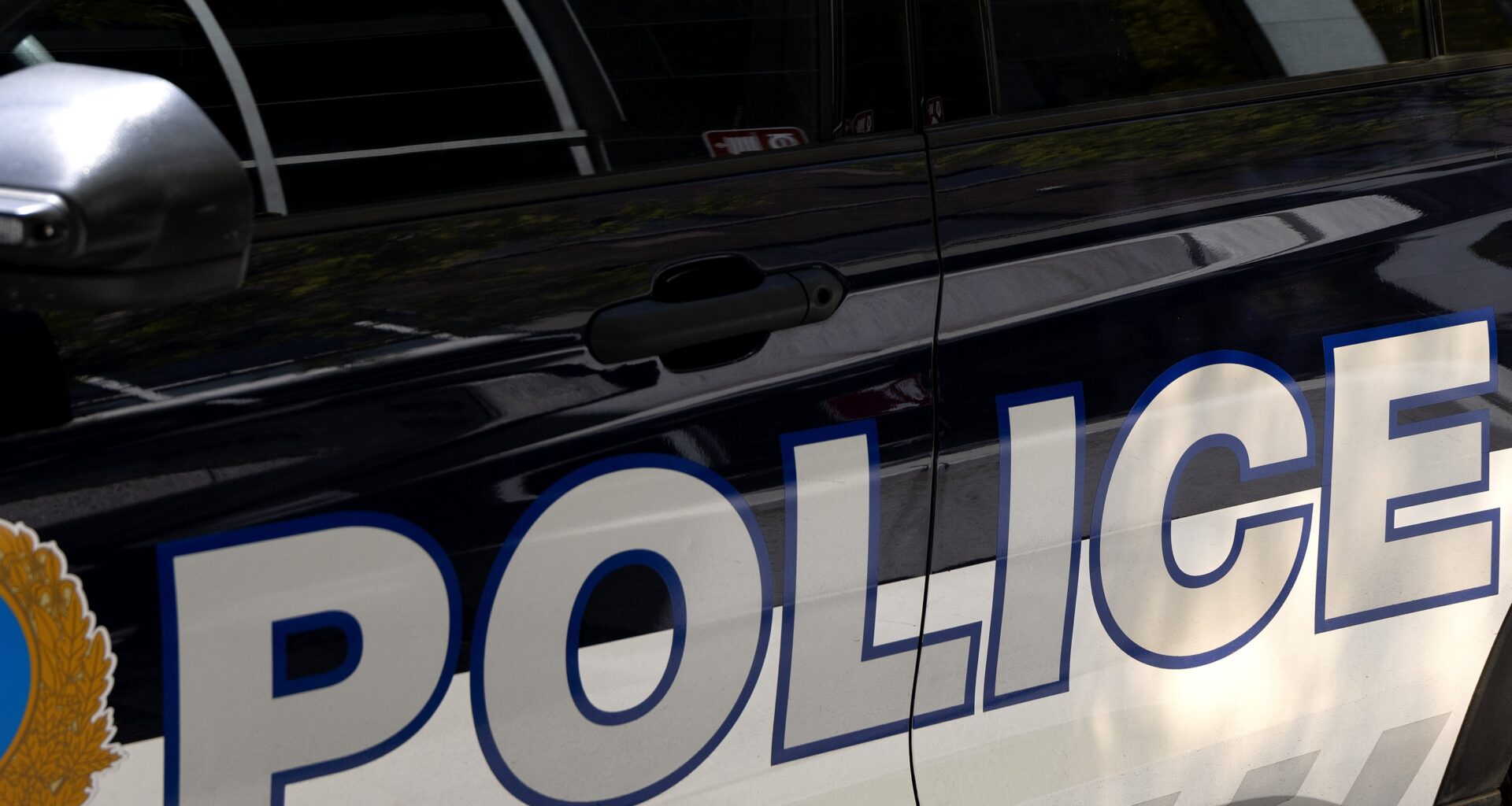 The side of a Montreal police car.
