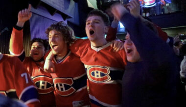 Fans celebrate in Montreal on Sunday night after the Canadiens won in overtime against the Tampa Bay Lightning in Game 1 of their playoff series.
