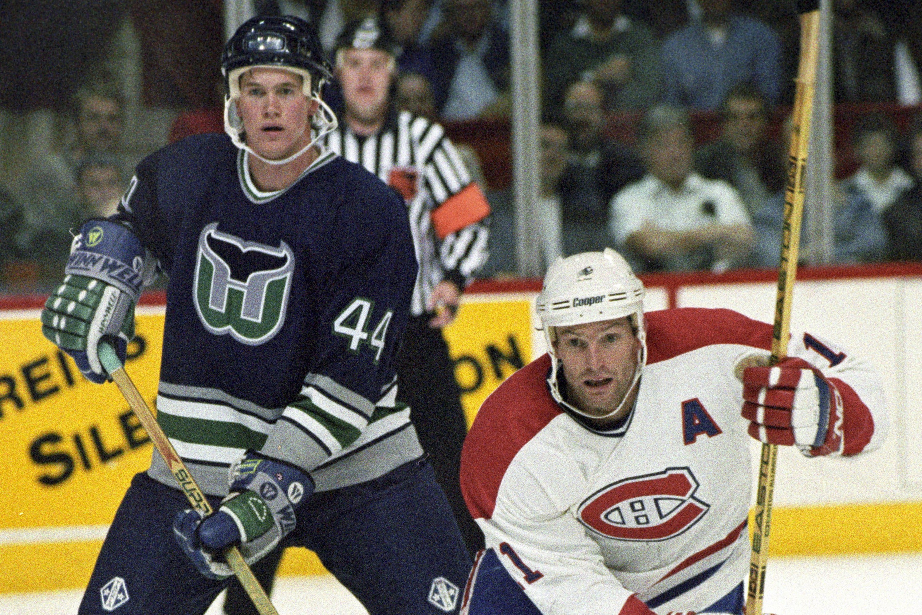 Hartford Whalers defenceman Chris Pronger and Canadiens forward Kirk Muller during game in Montreal on Oct. 6, 1993.