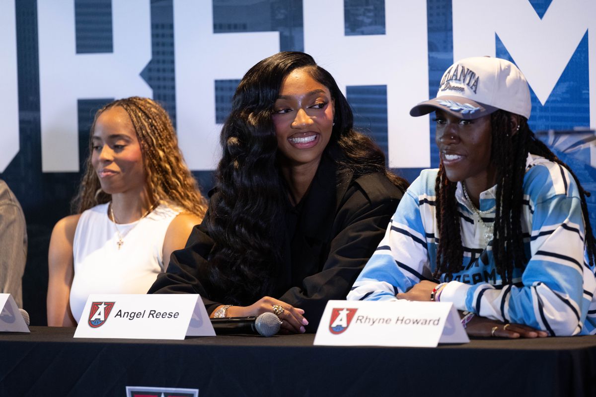 Angel Reese speaks to reporters during her introductory Dream press conference