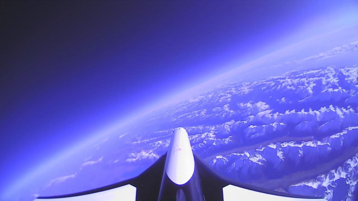 Uncrewed Mk-II rocket-powered spaceplane flying in the sky