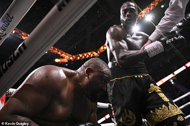 Deontay Wilder sends Derek Chisora to the floor - after telling him 'I'm sorry, I love you'