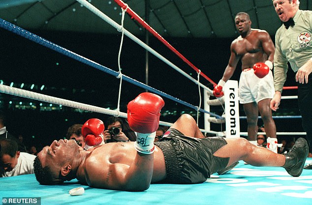 Mike Tyson lies flat on his back after James 'Buster' Douglas had pulled off the biggest upset of all time as a 42-1 outsider