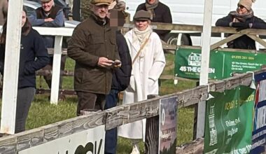 Geri Halliwell, dressed all in white, arrives at a point-to-point racing event at Edgcote with husband Christian Horner (to her left in brown cap)
