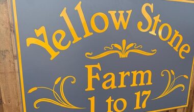 Travellers have unveiled a sign for a new 'illegal' farm in Surrey - less than a week after more than a dozen caravans arrived over Easter