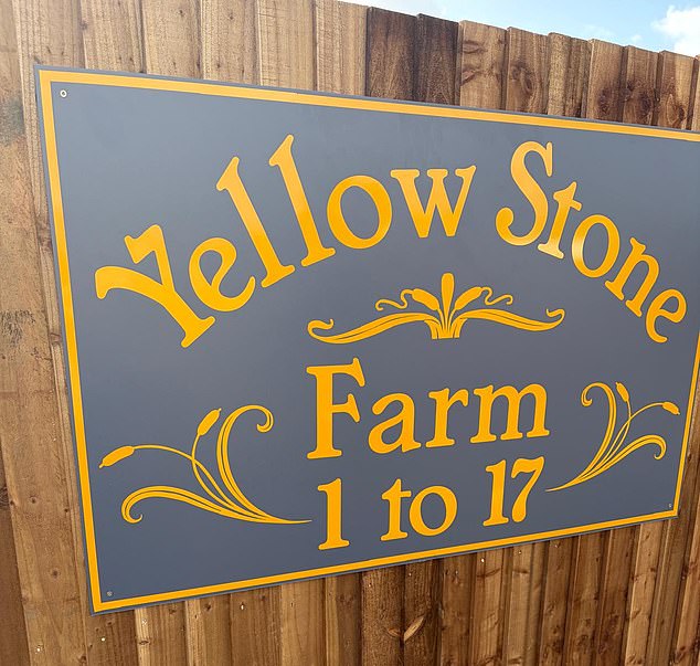 Travellers have unveiled a sign for a new 'illegal' farm in Surrey - less than a week after more than a dozen caravans arrived over Easter