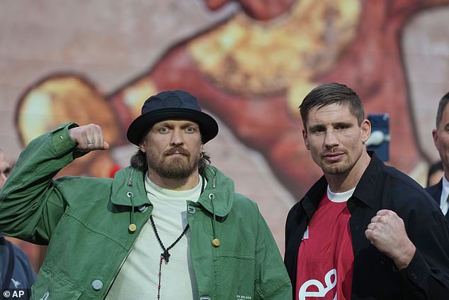 Usyk (left) and Rico Verhoeven (right) face off during a press conference to announce their upcoming WBC World Heavyweight fight